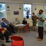 At Obama headquarters the delegation learns about community organizing. At Obama headquarters the delegation learns about community organizing.