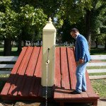 Oleg S tried his hand at pumping water in the Salem town square. Oleg S tried his hand at pumping water in the Salem town square.