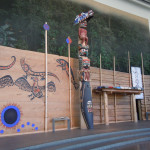 There are a dozen totem poles displayed in the Grand Hall. There are a dozen totem poles displayed in the Grand Hall.