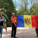 After our visit at city hall, Daniel gave us a walking tour of the sites nearby. We paused by a park while Daniel explained the symbology of the Moldovan flag which Peter and Ray are holding. After our visit at city hall, Daniel gave us a walking tour of the sites nearby. We paused by a park while Daniel explained the symbology of the Moldovan flag which Peter and Ray are holding.