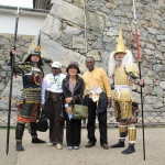 The Joneses and their hostess pose at the castle.