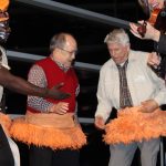 Jim N. (on the right) and another member of the audience joined Caribique in one of his African dances. Jim N. (on the right) and another member of the audience joined Caribique in one of his African dances.
