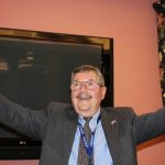 Ray Kiszely, also co-exchange director, began his remarks with a display of the US and Kosovar flags. Ray Kiszely, also co-exchange director, began his remarks with a display of the US and Kosovar flags.