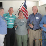 Jim N., Jennie and Gary R. posed with the host exchange director of the Bundaberg club. Jim N., Jennie and Gary R. posed with the host exchange director of the Bundaberg club.