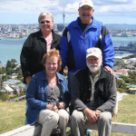 Doris and Ray K. with their hosts; Auckland and the Sky Tower in the background.