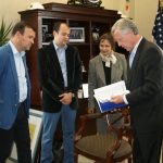 Both Olegs take a look as the mayor shows them the budget for Winston-Salem. Both Olegs take a look as the mayor shows them the budget for Winston-Salem.