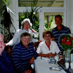 Jane C. enjoys breakfast with several "breakfast hosts."