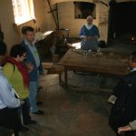 Tuesday morning the delegation enjoyed a tour of Old Salem. This Moravian guide told the group about various spices the Moravians used in their cooking. Tuesday morning the delegation enjoyed a tour of Old Salem. This Moravian guide told the group about various spices the Moravians used in their cooking.