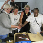 All the exchange directors cut a friendship cake.