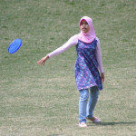 Playing Frisbee.