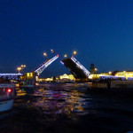 .....hundreds of boats raced from one bridge to the next, jockeying for the best position to view the bridges opening up. .....hundreds of boats raced from one bridge to the next, jockeying for the best position to view the bridges opening up.
