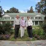 Brian M., Dottie B., and Jeanne M. pose in front of the house.... Brian M., Dottie B., and Jeanne M. pose in front of the house....