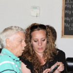 Jim North and Valmire Havolli sharing photos.