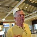 Russ Nussbaum modeling a gift of a traditional hat from Kosovo