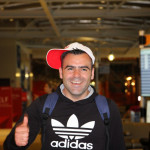 Hartim Gashi modeling his NCState hat, a gift from the Pfeiffers.