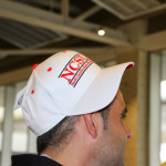 Hartim proudly wearing his NC State hat.