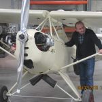 Lasha Labadze admiring the airplane models at the Aviation II Building of Guilford Technical Community College Lasha Labadze admiring the airplane models at the Aviation II Building of Guilford Technical Community College