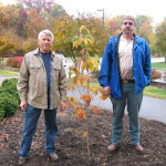 Jim & the manager of Triad Park plant a dogwood tree given by FFCNC in honor of our Turkish guests.