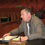 Igor tries the city attorney's seat.